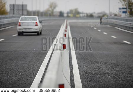Shallow Depth Of Field (selective Focus) Image With Concrete Jersey Barriers (jersey Walls Or Jersey