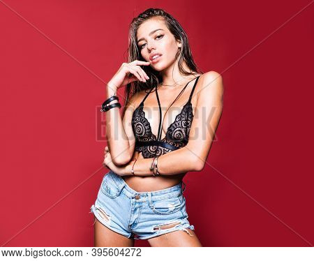 Girl In The Bra. Young Woman With Sexy Body In Black Lingerie