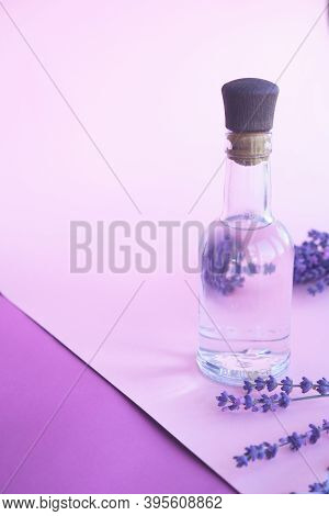 Natural Aromatic Lavender Water - Hydrolat And A Bouquet Of Lavender Flowers. High Quality Photo