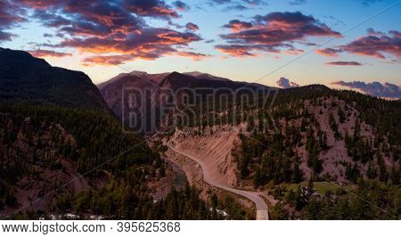 Aerial Panoramic View Of A Scenic Dirt Road Towards Gold Bridge In The Valley Surrounded By Canadian
