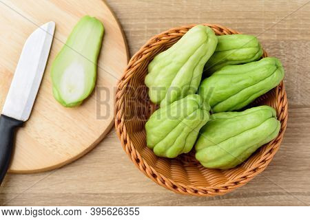 Chayote Squash Or Mirlition Squash On Wooden Cutting Board, Organic Vegetable, Edible Plant Fruit