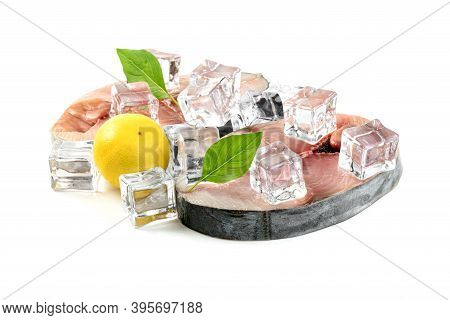 Spanish Mackerel Slice Or Spotted Mackerels With Lemon And Leaf Basil And Ice Cube Isolated On White