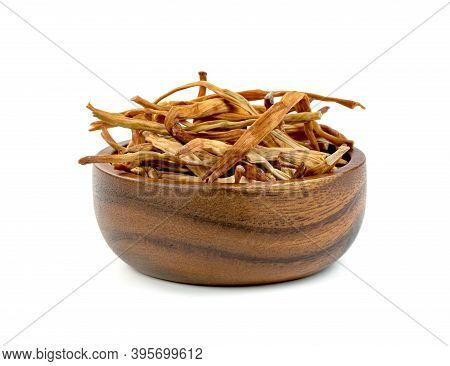 Day Lily Or Hemerocallis Lilioasphodelus In Wooden Bowl Isolated On White Background