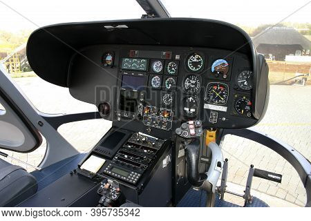 The Interior Of The Cocpit Of A Helicopter Showing The Flight Controls