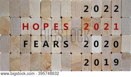 Business And New Year Concept Of Hopes 2021. Wooden Blocks With The Inscription 'fears 2020, Hopes 2