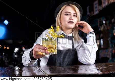 Girl Bartender Mixes A Cocktail On The Pothouse