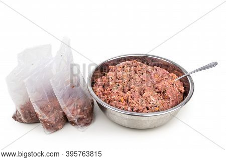 Minced Barf Raw Food Recipe For Dogs Consisting Meat, Organs, Fish, Eggs And Vegetable Are Packaged 