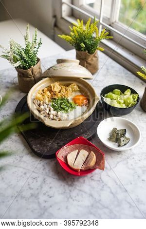 Claypot Chinese Chicken Porridge With Ham And Salad