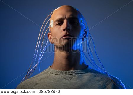 Man With Electrodes In His Head Is A Futuristic Concept Of Virtual Reality And Mind Control. Neuro I