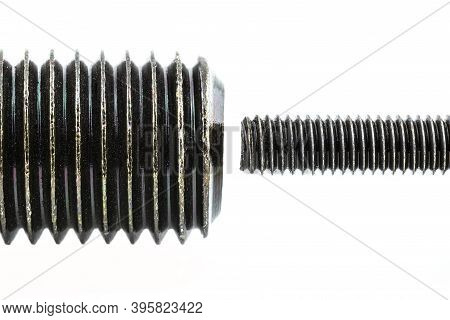 A Background Made From A Macro Shot Of A Grease Coated Black Screw Thread, Isolated On A White Backg