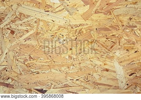 Pressed Wooden Shavings Panel Background, Texture Of Oriented Strand Board, Osb