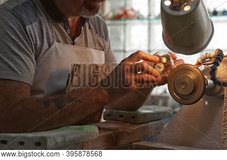 A Craftsman Working In The Sculpting Department At The Waterford Crystal Factory, In The City Of Wat