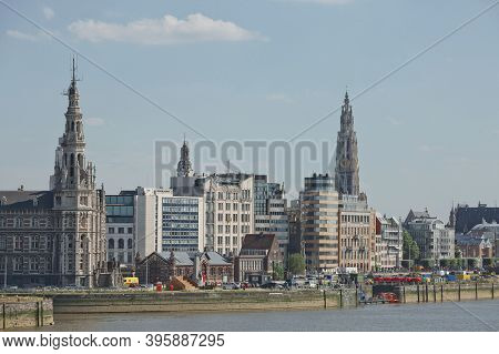 Cityscape Of A Port Of Antwerp And Cathedral Of Our Lady In Belgium Over The River
