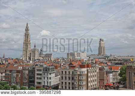 Cityscape Of A Port Of Antwerp And Cathedral Of Our Lady In Belgium Over The River