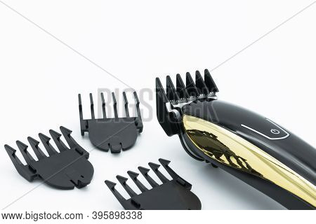 Close-up View Of The Cordless Electric Hair Clipper Isolated On The White Background.