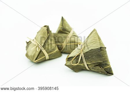 Closeup View Of The Zongzi (sticky Rice Dumplings), It Is A Traditional Chinese Rice Dish Made Of Gl