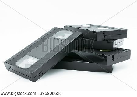 Stack Of Vhs Video Tape Cassette Isolated On White Background.