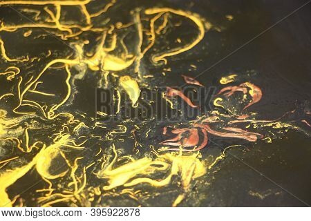 Black And Yellow Pigments Difusion Into Each Other Abstract Colorful Vivid Background