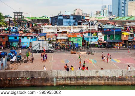 Manila, Philippines - March 18, 2013: Poor Local Houses In Slum Neighbourhood Of Manila City In Phil