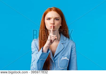 Quiet Please Im Trying Sleep. Displeased And Disturbed Young Redhead College Girl Living Dormitory A