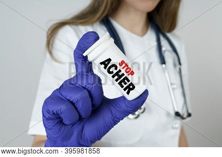 Medicine And Health Concept. The Doctor Holds A Medicine In His Hands, Which Says - Stop Acher