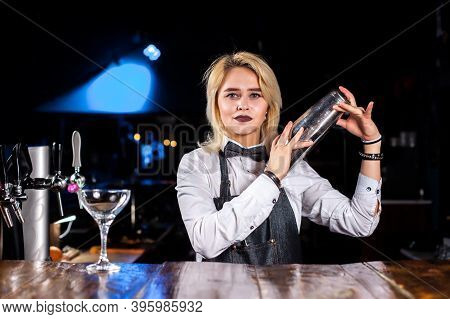 Girl Bartender Creates A Cocktail On The Saloon