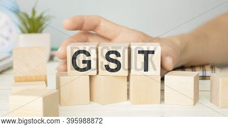 Gst Word Written On Wood Block. Gst Text On Wooden Table For Your Desing, Concept.