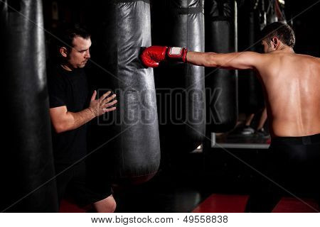 Boxer training with his coach