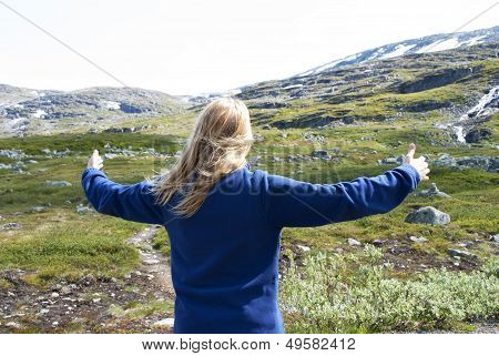 Woman Enjoying The Freedom In Nature