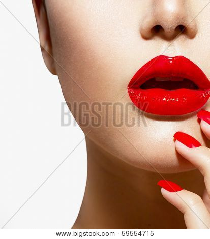 Red Sexy Lips and Nails closeup. Open Mouth. Manicure and Makeup. Make up concept. Half of Beauty model girl's face isolated on white background