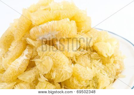 Pomelo Slices On Dish In Pyramid Shape