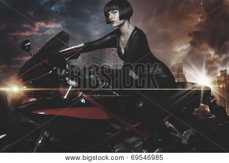 Rebel city, Sensual and Beautiful brunette woman on a motorcycle