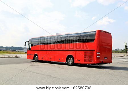 Red Coach Bus Starts Journey