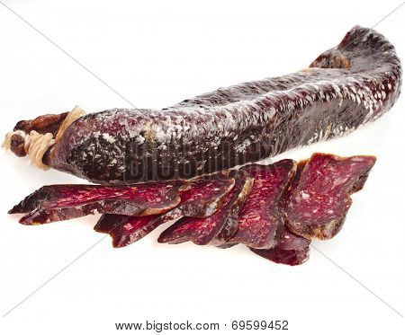 dried solid sausages sudzhuk isolated on white background