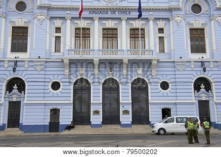 Policamen in front of the Chilean Navy building, Valparaiso, Chile.