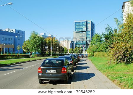 Pasilaiciai District Street With Cars And Houses