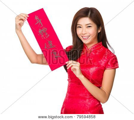 Woman hold with Fai Chun, phrase meaning is blessing for good health 