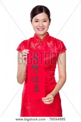 Chinese woman hold with Fai Chun, phrase meaning is blessing for good health 