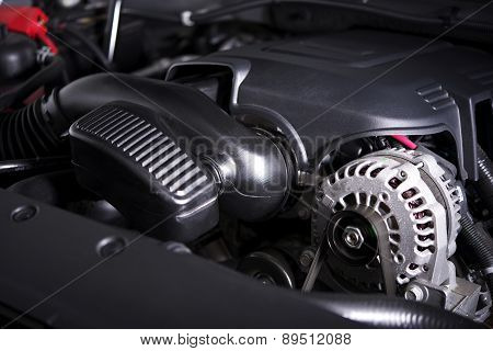 Modern Car Alternator And Engine