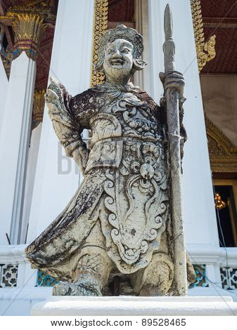 Chinese Standing Giant Carved Out Of Rock In Wat Suthat Thep Wararam