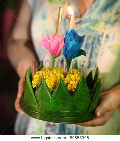 Woman Holding Boat With Candles And Flowers Are Given For Thailands Traditional Loy Krathong Festiva