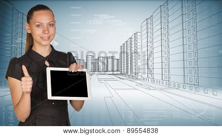 Smiling young woman holging tablet