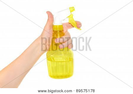 Female hand with sprayer