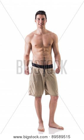 Full figure shot of handsome shirtless young man