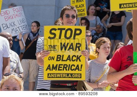 Woman Holding Sign