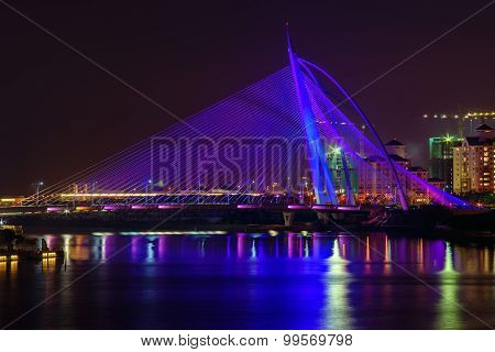 Beautiful Modern Bridge With Reflection At Night In Purple Colour
