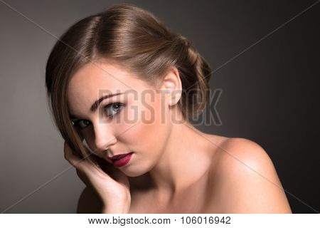 Sexy beautiful woman isolated on grey