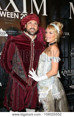 LOS ANGELES - OCT 24:  Maksim Chmerkovskiy, Peta Murgatroyd at the MAXIM Magazine's Official Halloween Party at the Private Estate on October 24, 2015 in Beverly Hills, CA