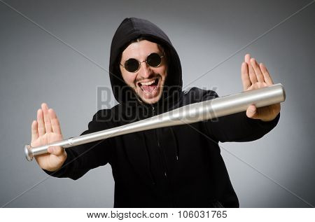 Aggressive man with basebal bat 