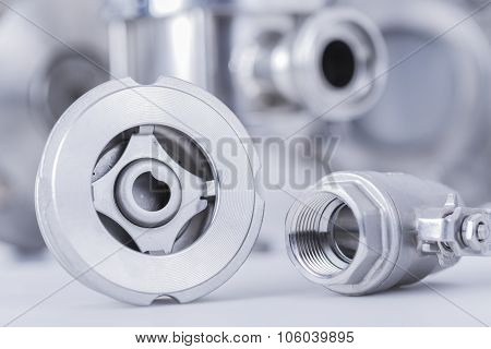 Check And Ball Valve With Selective Focus On Thread Fittings.